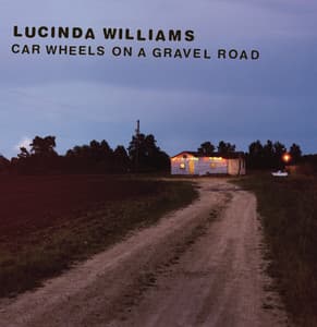 Car Wheels On A Gravel Road